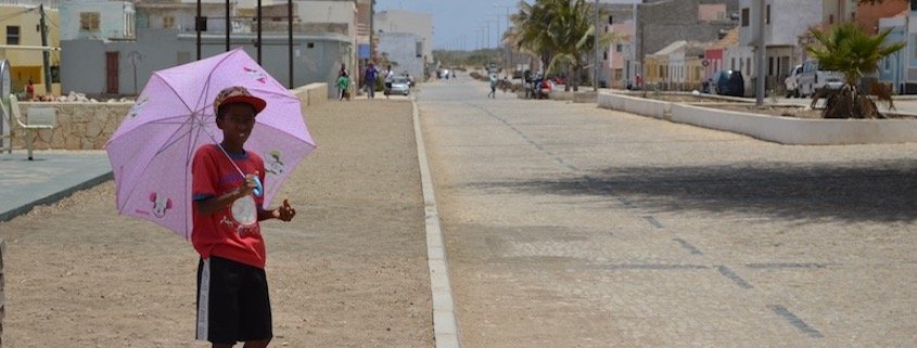 Boy with umbrella, Maio, Cape Verde